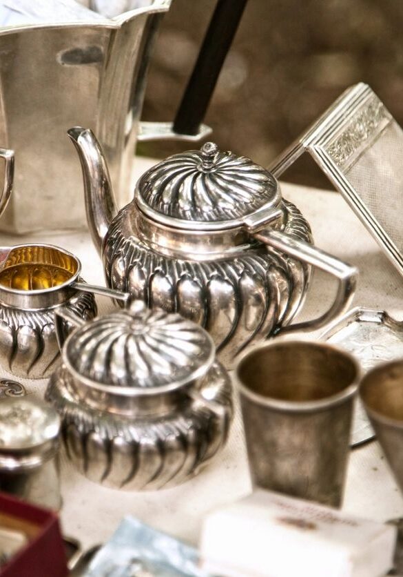 Antique silver tea set and utensils